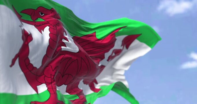 The Wales flag waving in the wind on a clear day