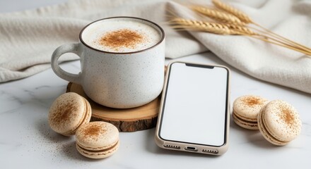 Cozy morning scene with a steaming latte macarons and a smartphone on a textured surface