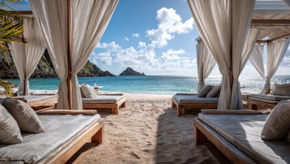 Tropical beach cabanas with sunbeds