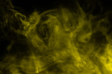 Yellow steam on a black background.