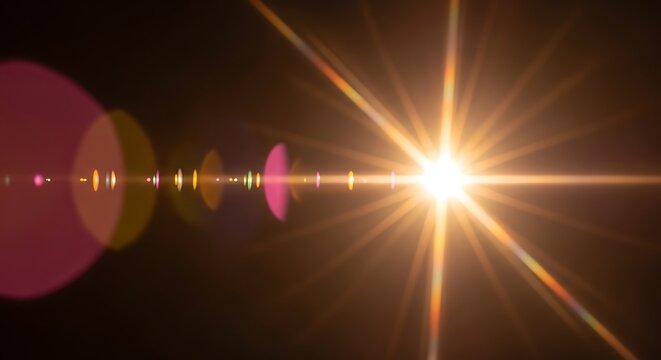 Bright sunlight with lens flare effect on a dark background