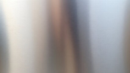 couter. Metal surface transitioning from rough matte to glossy finish with light reflections. safety posters, maintenance manuals, designed for precision metalworking and fabrication facilities.