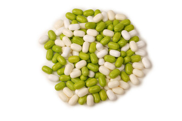 Sweet multicolored candies isolated on white background.