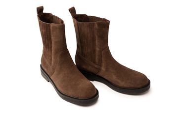 Brown leather boots isolated on white background.