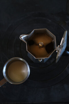 making mocha coffee on wood fire stove