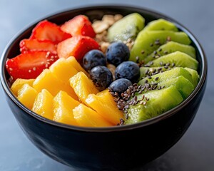 Oatmeal bowl with sliced fruit and seeds on rustic table, plantbased eating, morning routine concept