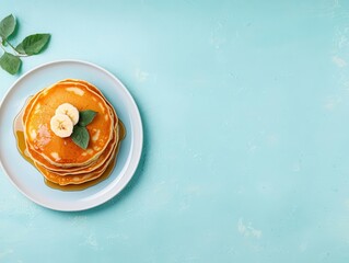 Sweet vegan breakfast with banana pancakes and agave syrup, plantbased eating, indulgent plantpowered treat