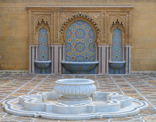 Intricate mosaic decoration in Rabat, Morroco. Islamic patterns around an ancient water well.	

