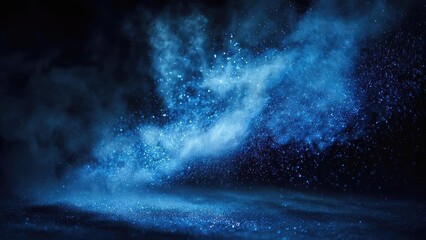 A stream of blue powder dust suspended in the air, with glowing specks against a dark background. Concept Blue powder dust, Glowing specks, Suspended particles, Dark background, Light scattering
