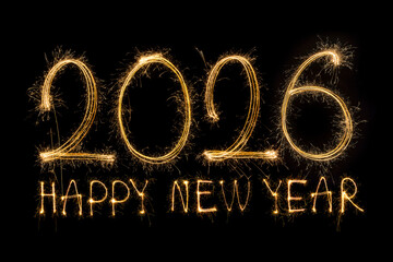 Happy New Year 2026. Burning sparkling text 2026 isolated on black background.