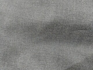 Close-Up of Grey Fabric Texture with Fine Weave Pattern