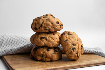 Cookies on wooden table. Photo cookies on napkin and light background. For article, blog and recipe. Photo food.