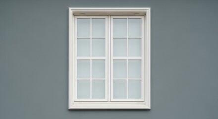Fototapeta premium Classic white window with clean lines against a grey wall offers a modern, minimalist architectural detail
