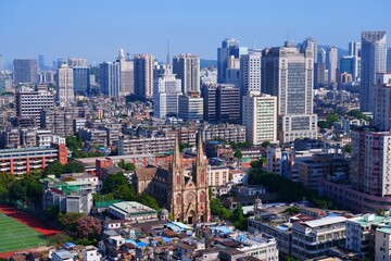 Guangzhou city skyline with Yuexiu district and Sacred Heart Cathedral. Guangzhou cityscape in Guangdong, China.