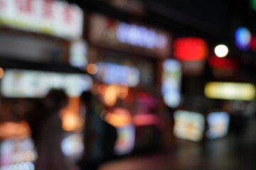 Night neon lights big city. Night abstract city defocused light background of Shawan town in Guangzhou city, China.