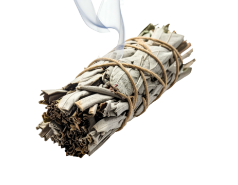 A bundle of dried herb leaves tied with twine emitting wispy white smoke against black