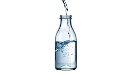 Transparent glass bottle being filled with clear water against a solid black background