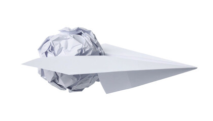 A crisp white paper airplane next to a wad of crumpled paper. Idea, fail, contrast