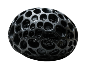 A dark sphere with interconnected holes, creating a honeycomb-like structure on a black background