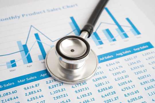 Stethoscope on chart or graph paper, Financial, account, statistics and business data medical health.