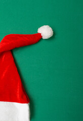 Santa Claus hat on a green background