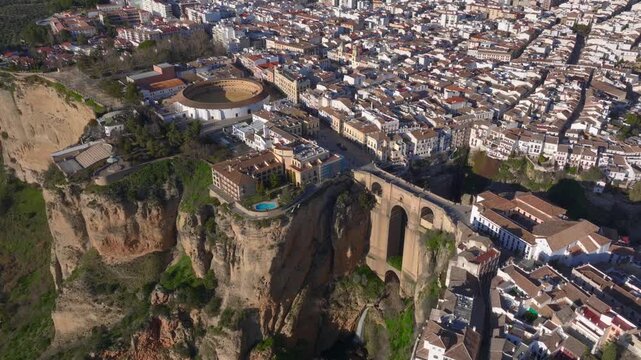 Puente Nuevo bridge in Ronda, Spain. Aerial View of dramatic cliffs, charming white houses, and captivating landscape