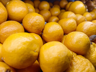 Large Pile of Bright Orange Mandarin Oranges Fruit Texture