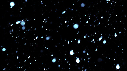 Snowfall. Winter heavy snowflakes. Overlay texture isolated black background