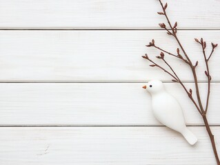 White Bird Figure on Rustic White Wooden Surface with Branches