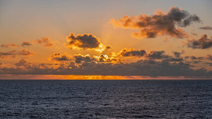 Ocean Sunset with Clouds and Golden Light