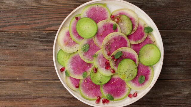 watermelon radish daikon salad on plate food top rotation