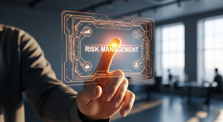 Hand touching a bright orange digital interface with text RISK MANAGEMENT. Represents modern technology, future trends and business decision making.