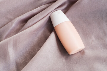 foundation mockup Cosmetic Scene on Soft Fabric background