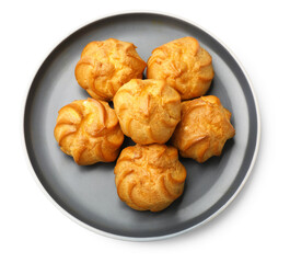 Fresh tasty profiteroles isolated on white, top view