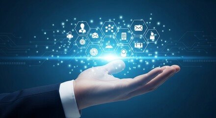 Hand holding digital icons on a blue technological backdrop, symbolizing connection, network, and communication in modern business or technology