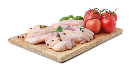 Raw chicken thighs with herbs and tomatoes isolated on white