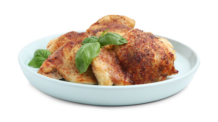 Tasty roasted chicken thighs with basil isolated on white
