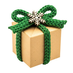 Holiday gift box with green knitted ribbon and wooden snowflake isolated on transparent background