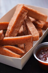tray of spiced ham chips