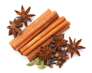 Mulled wine spices. Cinnamon sticks, anise stars, cardamon seeds and cloves isolated on white, top view