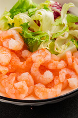 Shrimp salad seafood appetizer tasty snack fresh gourmet food background on table rustic food top view copy space pescetarian diet