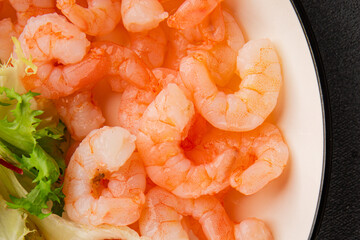 Shrimp salad seafood appetizer tasty snack fresh gourmet food background on table rustic food top view copy space pescetarian diet