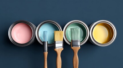 Top view of four open paint cans with pastel pink, light blue, mint and warm yellow paint, showing color samples for home interior design project, selecting modern wall shade
