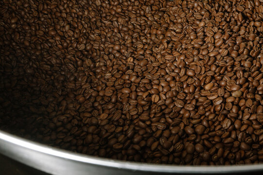 many just roasted coffee beans background