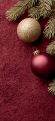 Red Textured Christmas Background with Green Pine Branches and Gold Bauble