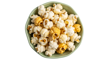 Overhead view of popcorn in a green bowl against a black background