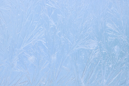 Light blue frost texture ideal for winter sale graphics and clean holiday frames. Soft icy background that works as a subtle frost overlay for branding, posters and seasonal ads. Copy space - Powered by Adobe