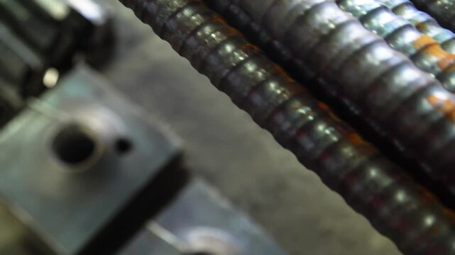 Industrial Threaded Rod and Metal Fastener Close-Up