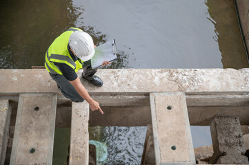 Environmental scientists are examining drainage channels around the city.