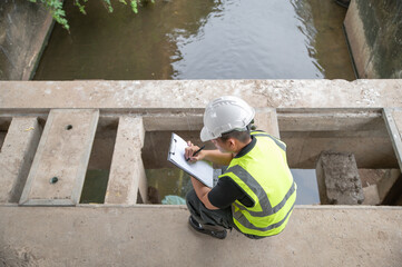 Environmental scientists are examining drainage channels around the city.
